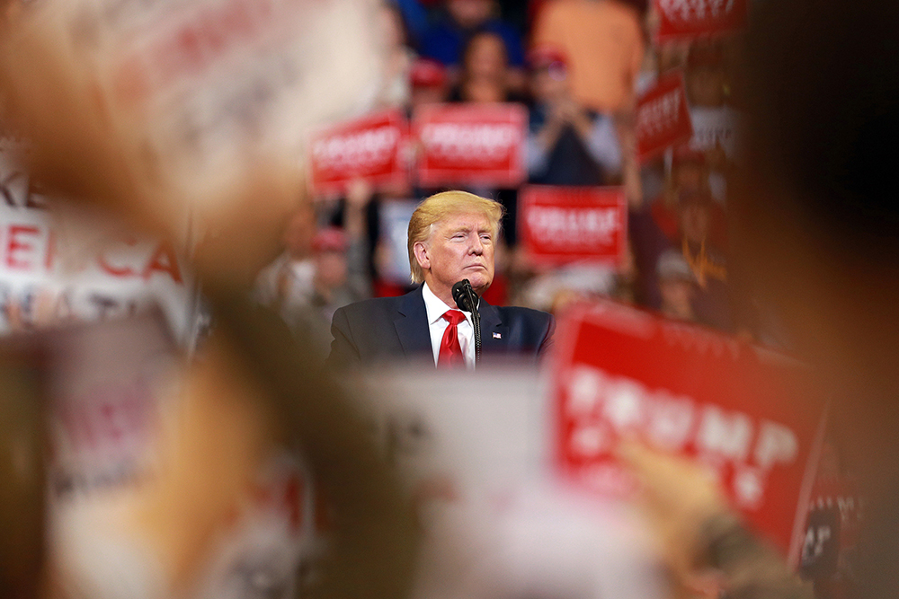 In this November 14, 2019 file photo, President Donald Trump pauses speaking at a rally in Bossier City, Louisiana.