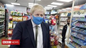 PM sagt, Gesichtsmasken sollten in Geschäften getragen werden
